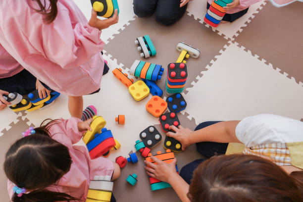 istock Children playing at nursery school 1307041548