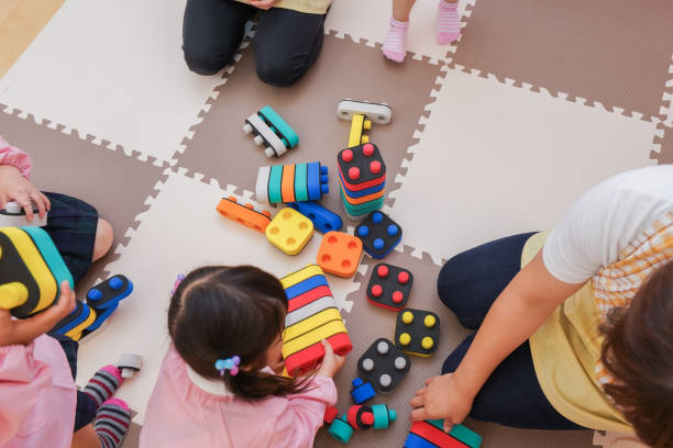 istock Children playing at nursery school 1307041550