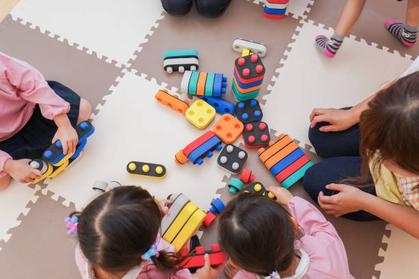 istock Children playing at nursery school 1307041554