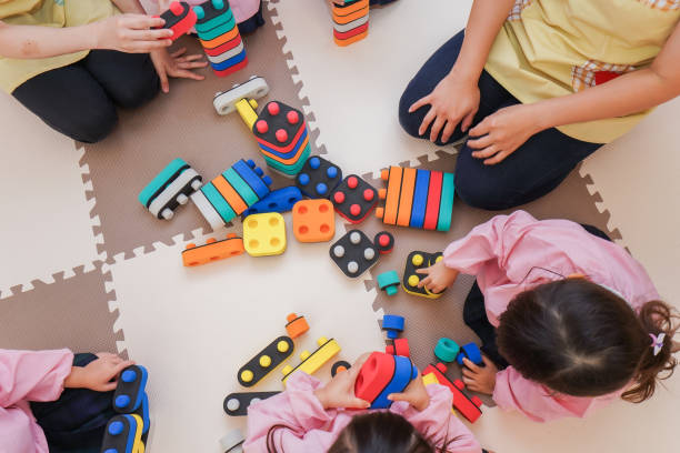 istock Children playing at nursery school 1307041559
