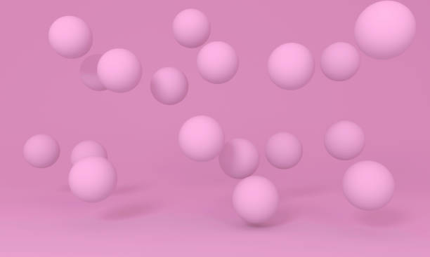 istock Pink floating spheres on colorful background. 1307042847
