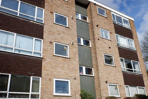 istock 1970s apartment building in town centre 1307044467
