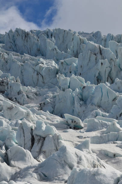 Beautiful blue skies over an ice fall on a glacier.
