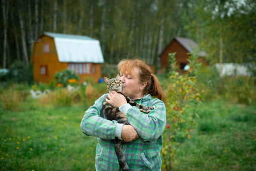 Mature woman with cat