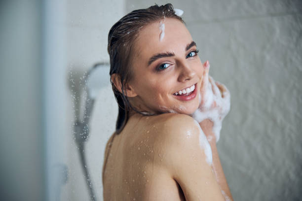 istock Cheerful cute lady enjoying her aquatic procedure 1307050941