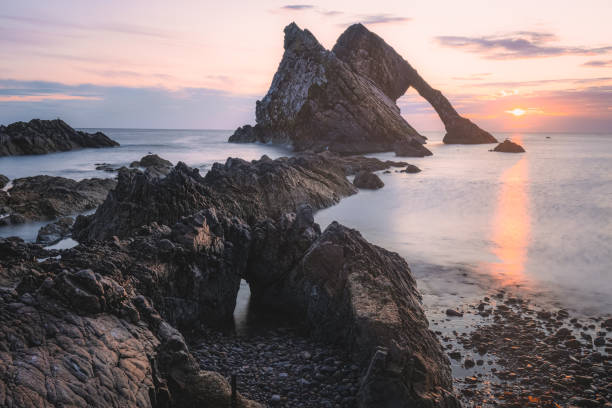 istock Bow Fiddle Rock, Scotland 1307052089