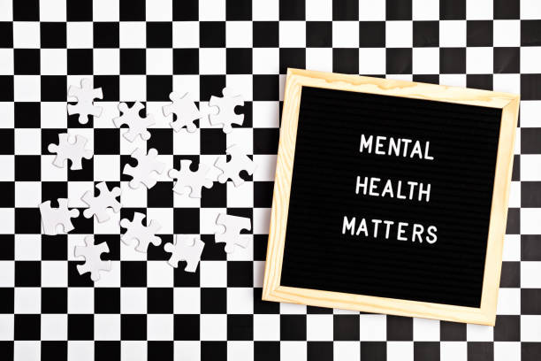 Mental health matters motivational quote on the letter board. Inspiration psycological text with pazzle pieces Mental health matters motivational quote on the letter board. Inspiration psycological text with pazzle pieces. Flat lay, top view psycological stock pictures, royalty-free photos & images