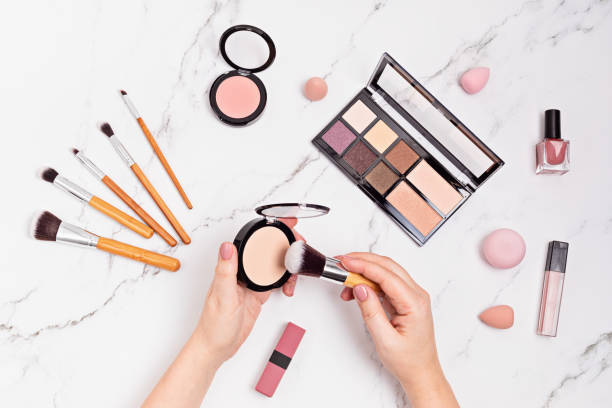 istock Flat lay with set of professional decorative cosmetics, makeup tools. 1307052290