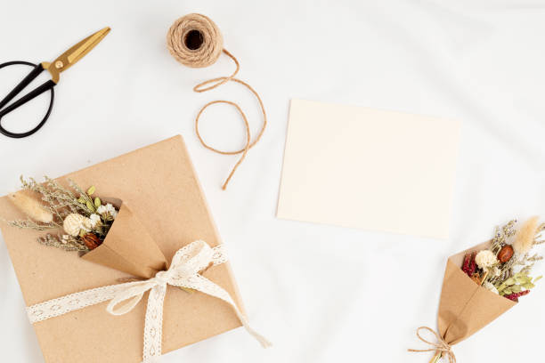 istock Gift boxes in craft paper and natural decorations, creative and recyclable holidays present wrapping 1307052297