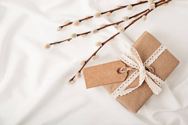 istock Gift boxes in craft paper and natural decorations, creative and recyclable holidays present wrapping 1307052307