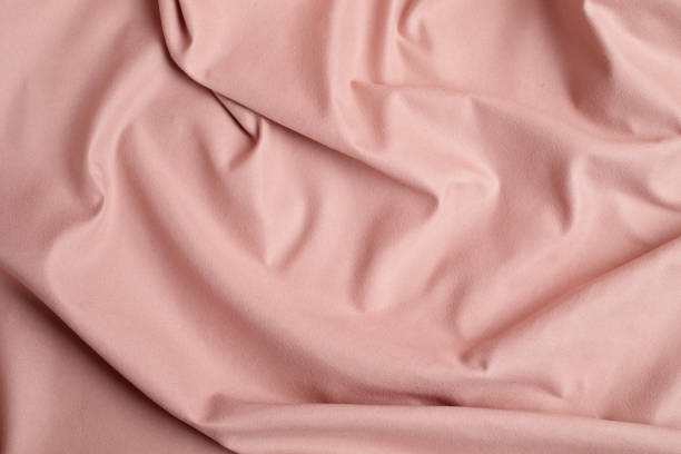 istock Pink fabric background. Abstract backdrop luxury cloth 1307052346
