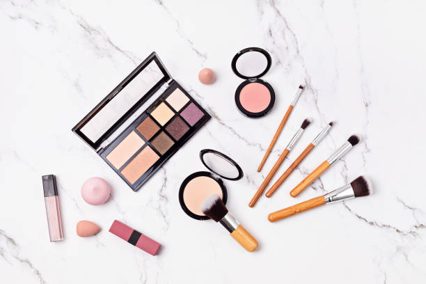 istock Flat lay with set of professional decorative cosmetics, makeup tools. 1307052472