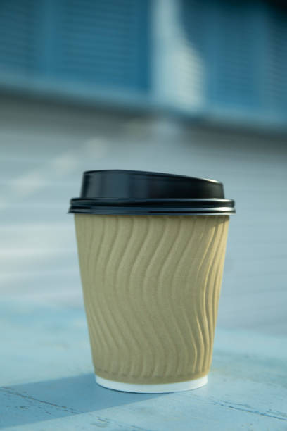 istock Blank paper cup outdoor, space for text 1307052496