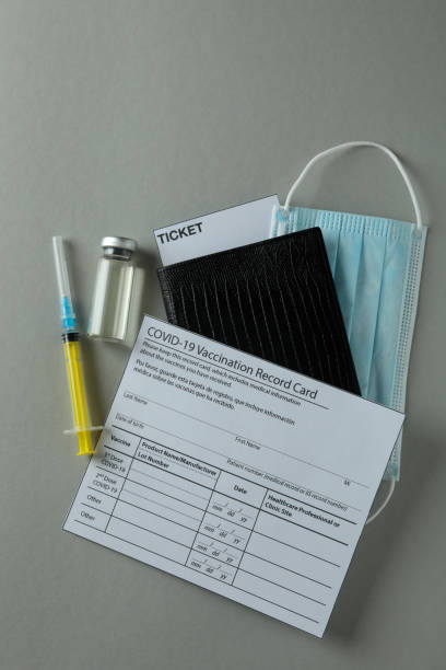 istock Concept of Covid - 19 vaccination on gray background 1307053686