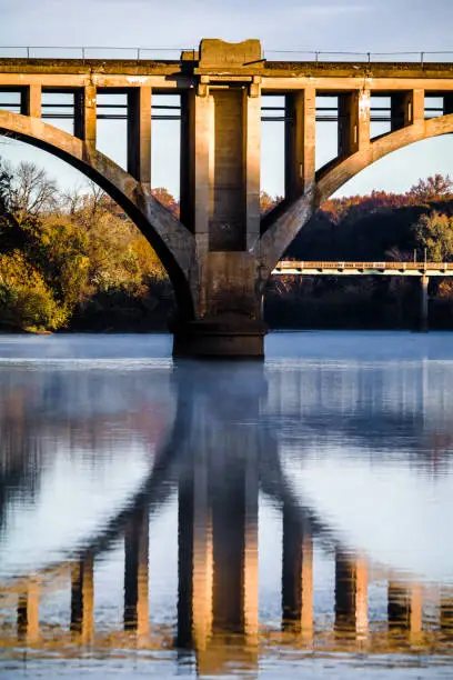 Center pylon of the RF&P Railroad Bridge reflected in the Rappahanock River below.