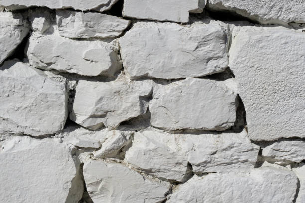 istock Vintage wall of large masonry. 1307054975