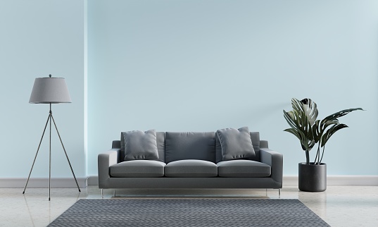 Luxury modern interior of blue pastel and gray tone living room home decor concept background. Three legs electric lamp and monstera pot on marble floor and mat. 3D illustration rendering graphic