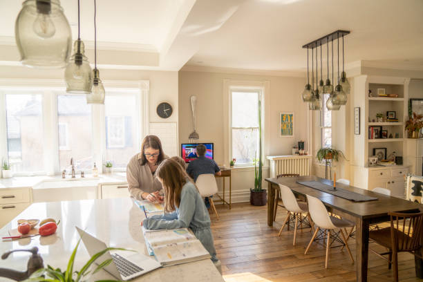 istock Parents Working and Home Schooling During The Pandemic 1307056330