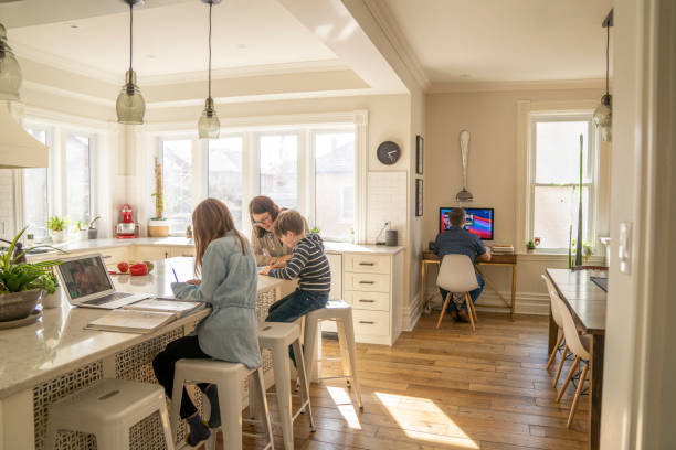 istock Parents Working and Home Schooling During The Pandemic 1307056334