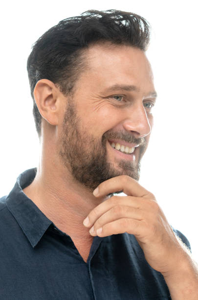 istock A portrait of a grinning man 1307056574
