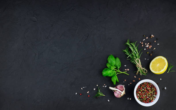 istock Garlic, Oil And Spices on black background 1307057937