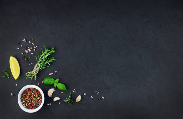 istock Garlic, Oil And Spices on black background 1307057956