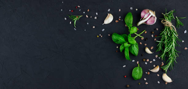 istock Garlic, Oil And Spices on black background 1307058137