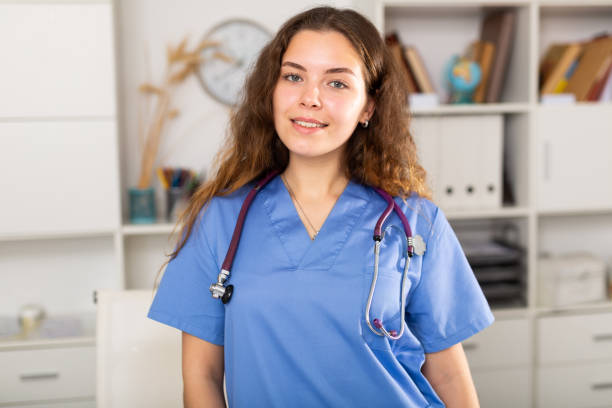 istock Young elegant doctor woman with a stethoscope 1307058311