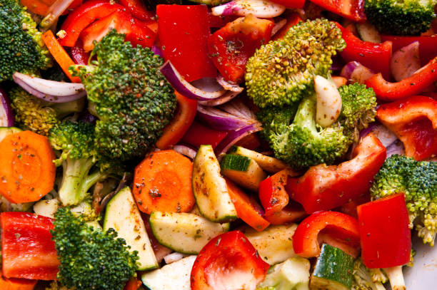 istock Fried chicken stripes with colorful vegetables dish 1307061865