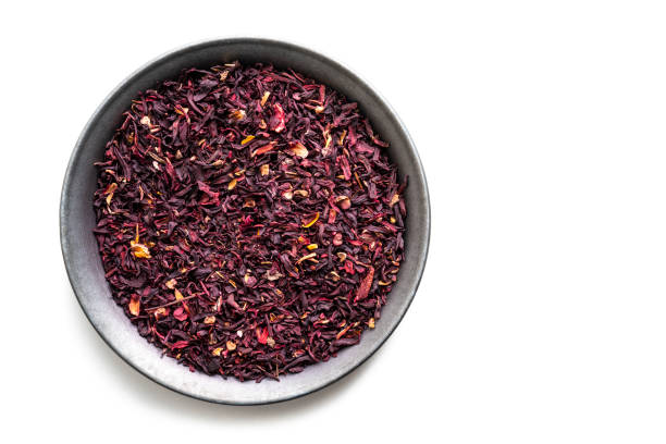 istock Hibiscus Roselle dried flower petals for tea isolated on white 1307061879
