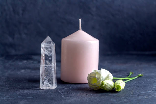 Magic vintage still life with crystals, pink candle and rose flowers. Meditation reiki. Ritual for love and chakra balance. Esoteric and pagan rituals, witchcraft Wiccan or spiritual practice (healing). Magic vintage still life with crystals, pink candle and rose flowers. Meditation reiki. Ritual for love and chakra balance. Esoteric, pagan rituals, witchcraft Wiccan or spiritual practice (healing) crystal altar stock pictures, royalty-free photos & images