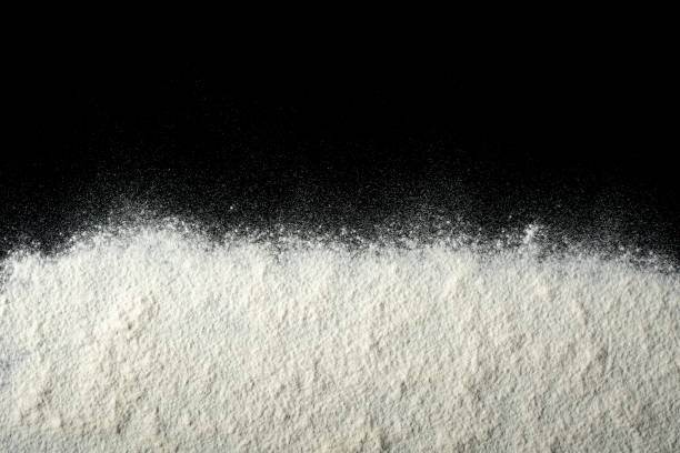 Flour scattered on a black table. Flour scattered on a black table. coke coal stock pictures, royalty-free photos & images