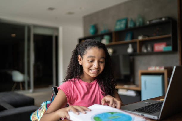istock Happy girl studying during homeschooling 1307065891