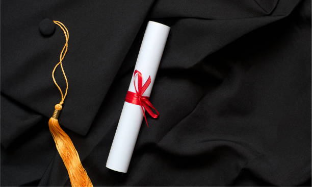 istock Top view concept with academical hat and diploma 1307072633
