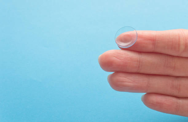 istock Contact lens on human hand 1307073553