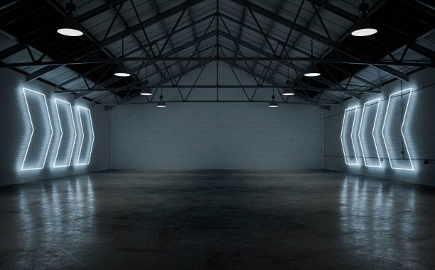empty warehouse interior illuminated by white neon lights - industrial interior imagens e fotografias de stock