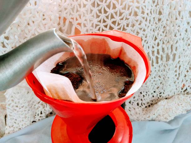 preparing coffee filtering coffee on the table coffee filter stock pictures, royalty-free photos & images