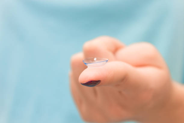istock Contact lens on human hand 1307074691