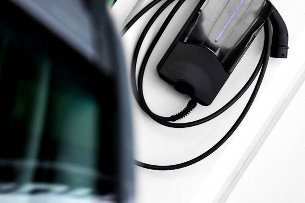 istock an plain modern electric car with a charger 1307074743