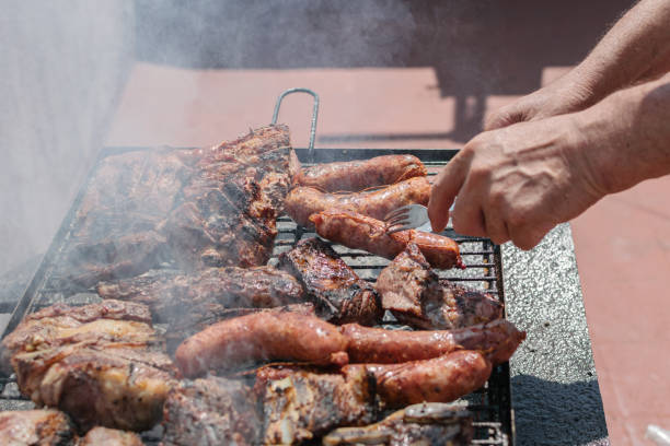 istock Argentinian grilled meat cooking - asado argentino 1307075821