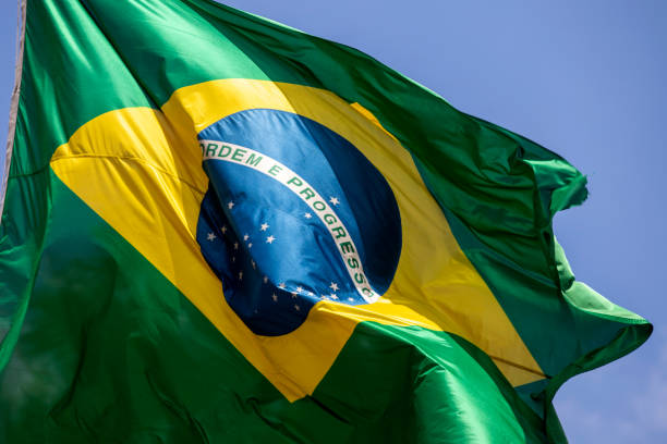 flag of Brazil dtail of brazilian flag on wind brazil stock pictures, royalty-free photos & images