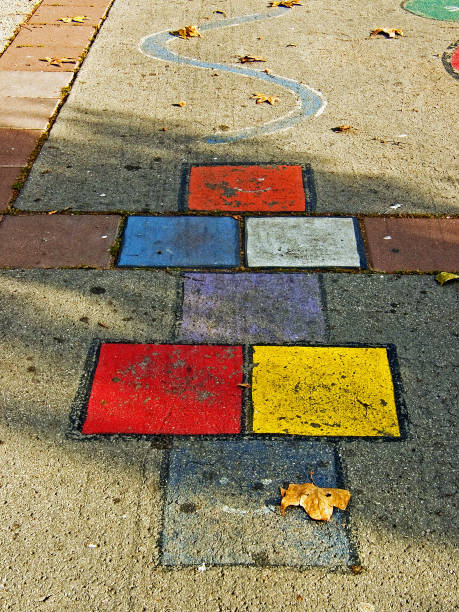 istock Hopscotch board painted on asphalt in a public park 1307076197