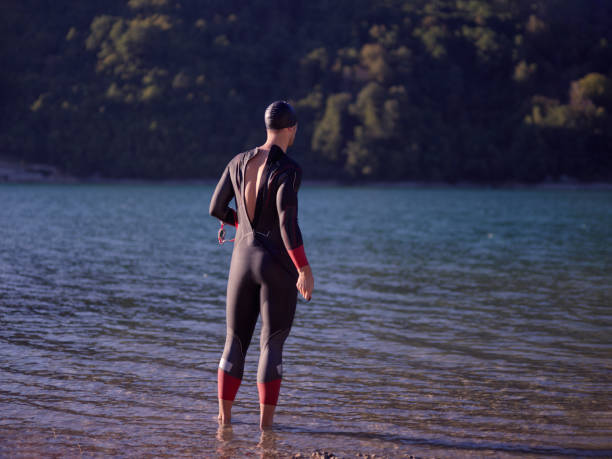 istock triathlete swimmer portrait wearing wetsuit on training 1307077676