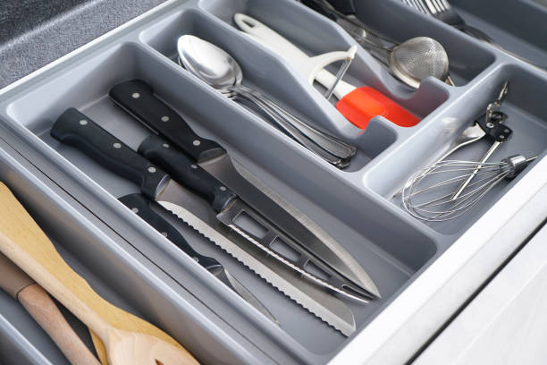 istock Set of clean kitchen utensils in drawer. 1307078508