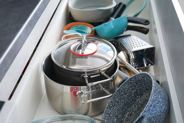 istock Set of clean kitchen utensils in drawer 1307078599
