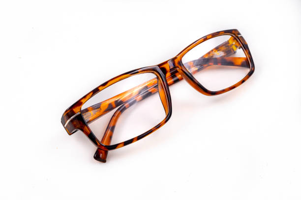 istock Glasses for people with visual impairments. Magnifying glasses for reading. Light background. 1307078642