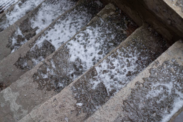 istock Frozen slippery stairway covered with ice during winter 1307080119