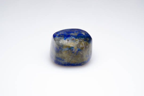 istock Natural lapis lazuli on white background 1307086081