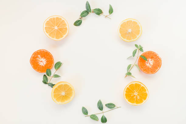 istock Fruit background. Colorful fresh fruits on white table. Orange,  lime, lemon, grapefruit. Flat lay, top view, copy space 1307086083