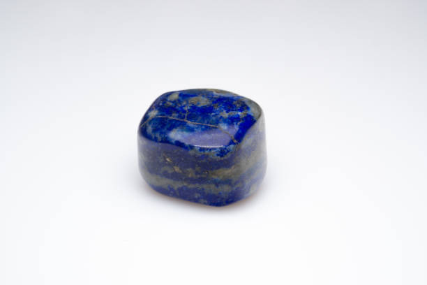 istock Natural lapis lazuli on white background 1307086102
